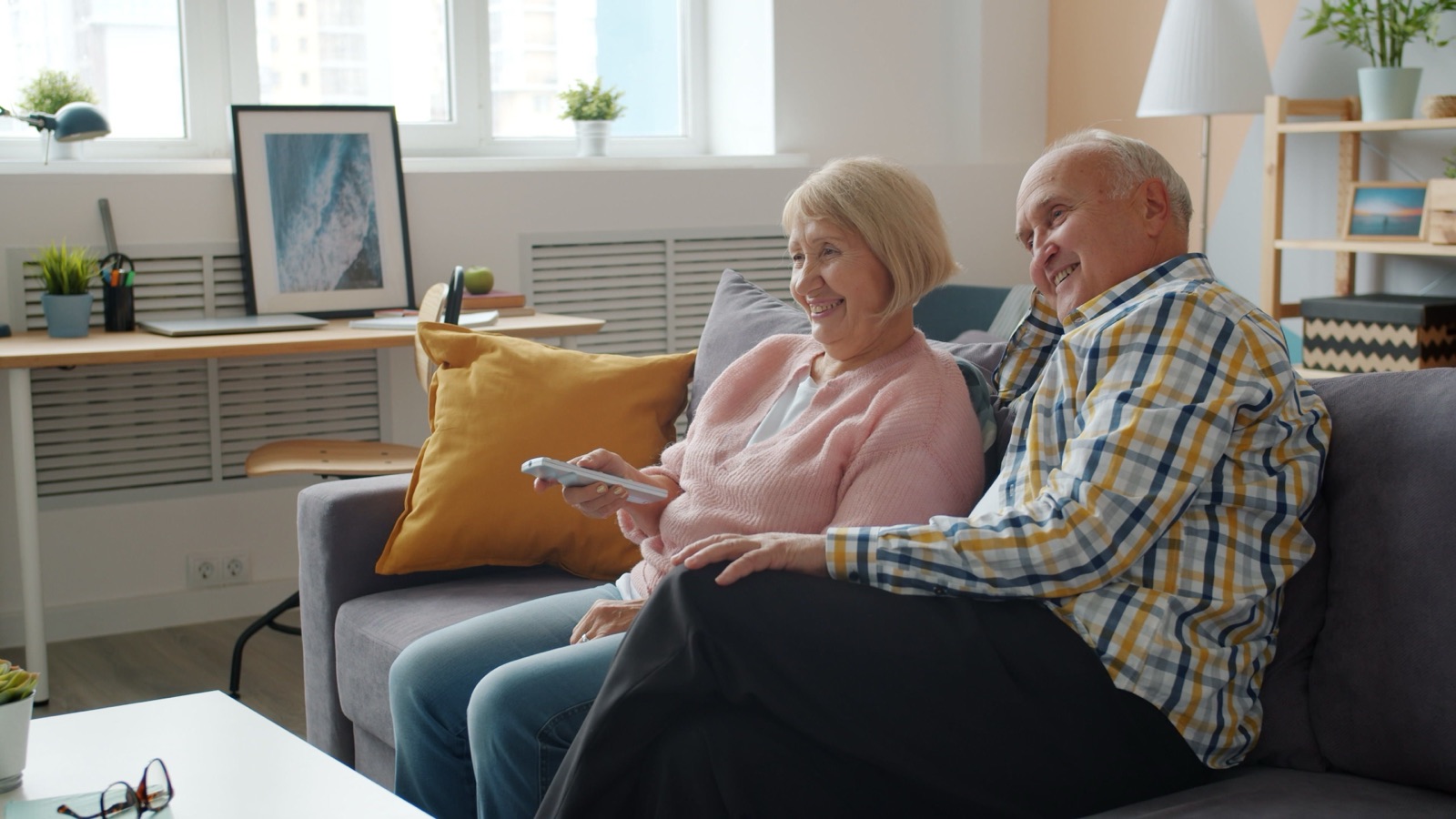 An older couple relaxing together at home